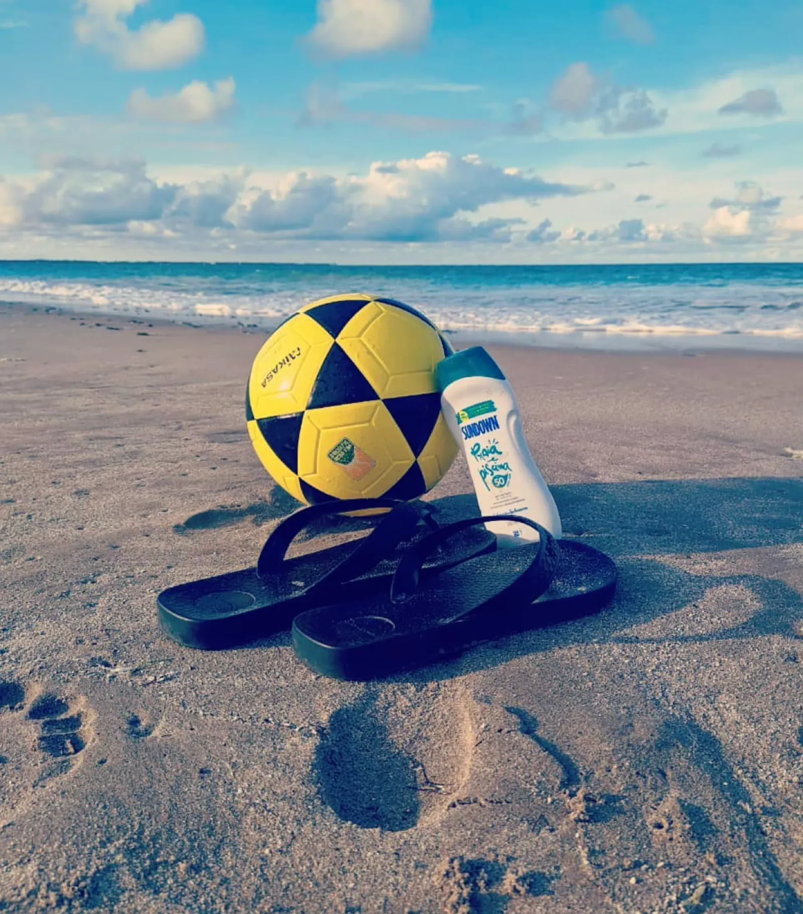 Playing altinha on a beach